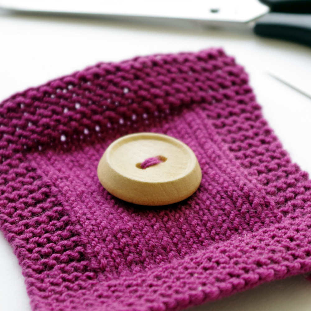 Tutorial: How to Sew a Snap Button onto Crocheted/Knitted Fabric - knotions