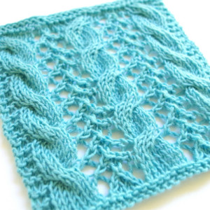 Lace knitting pattern with cables