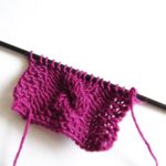 practicing cable knitting