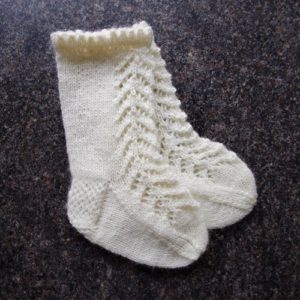 Knitted lace socks for baby